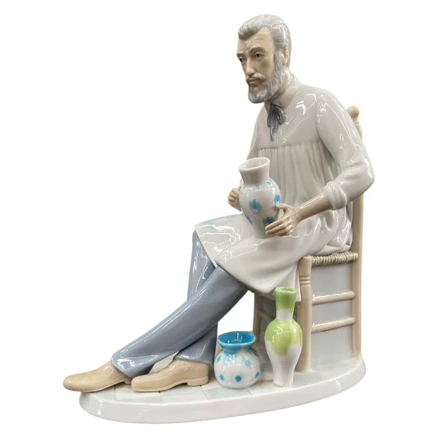 Spanish Porcelain Figurine of Seated Ceramic Painter - Image 2